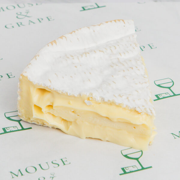 A soft yellow cheese with a white rind